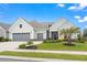 Charming home boasts a manicured lawn, landscaping, a two-car garage, and inviting curb appeal at 1211 Arezzo Ave., Myrtle Beach, SC 29572