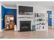 Cozy living room with fireplace, custom shelving, and stylish decor, creating a comfortable and inviting space at 1211 Arezzo Ave., Myrtle Beach, SC 29572