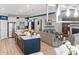 Open-concept living space connecting kitchen and living room with modern furnishings and decor at 1211 Arezzo Ave., Myrtle Beach, SC 29572