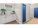 Bright laundry room with storage cabinets, granite countertop, and a window for natural light at 127 Emerald Rush Ct., Longs, SC 29568