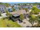 Beautiful aerial view showcasing a well-maintained property with lush greenery and serene waterfront access at 130 Pier Pointe Dr., Little River, SC 29566