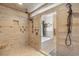Elegant primary bathroom with tub and shower, custom tile work and modern fixtures at 130 Pier Pointe Dr., Little River, SC 29566