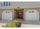 Charming home featuring a well-manicured lawn, inviting entryway, and a two-car garage with updated curb appeal at 130 Pier Pointe Dr., Little River, SC 29566