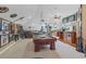 Spacious game room featuring a pool table, bar area, and memorabilia for the sports enthusiast at 130 Pier Pointe Dr., Little River, SC 29566