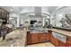 Gourmet kitchen featuring stainless steel appliances, granite countertops, and tile flooring at 130 Pier Pointe Dr., Little River, SC 29566