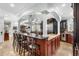 Gourmet kitchen with a large island, barstool seating, and stainless steel appliances at 130 Pier Pointe Dr., Little River, SC 29566