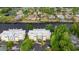 Aerial view showcases the beautiful condo building and stunning waterway homes with private docks and golf course at 1330 Villa Marbella Ct. # 3-105, Myrtle Beach, SC 29572