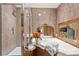 Elegant bathroom with a frameless glass shower, soaking tub, and luxurious finishes for a spa-like experience at 1330 Villa Marbella Ct. # 3-105, Myrtle Beach, SC 29572