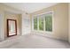 Bright, empty bedroom with a large window and plenty of space for personalization and decor at 1330 Villa Marbella Ct. # 3-105, Myrtle Beach, SC 29572