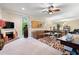 Living room featuring a fireplace, television, and elegant decor at 1330 Villa Marbella Ct. # 3-105, Myrtle Beach, SC 29572