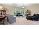 Intimate sitting room with large windows and designer furnishings at 1330 Villa Marbella Ct. # 3-105, Myrtle Beach, SC 29572