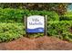 Villa Marbella community sign surrounded by lush landscaping at 1330 Villa Marbella Ct. # 3-105, Myrtle Beach, SC 29572