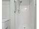 Bathroom features a walk-in shower with grab bars, and tile flooring at 1391 Turkey Ridge Rd. # C, Surfside Beach, SC 29575