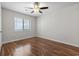 Neutral bedroom with wood-look floors and natural light at 1391 Turkey Ridge Rd. # C, Surfside Beach, SC 29575