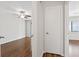 Hallway view into bedroom and view out to the exterior at 1391 Turkey Ridge Rd. # C, Surfside Beach, SC 29575