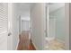 Hallway includes a bathroom, closet and view of the front door at 1391 Turkey Ridge Rd. # C, Surfside Beach, SC 29575