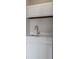 Close up of the wet bar featuring white cabinets, quartz countertops, and a stainless steel faucet at 1391 Turkey Ridge Rd. # C, Surfside Beach, SC 29575