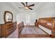 Bedroom with furniture, ceiling fan, and neutral carpeting at 140 Zinnia Dr., Myrtle Beach, SC 29579
