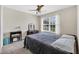 Bedroom featuring a ceiling fan and natural light from the large window at 140 Zinnia Dr., Myrtle Beach, SC 29579
