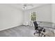 Bright bedroom with a large window and sleek glass-top desk at 140 Zinnia Dr., Myrtle Beach, SC 29579