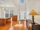 Bright foyer featuring hardwood floors, high ceilings, front door, and decorative furniture at 140 Zinnia Dr., Myrtle Beach, SC 29579