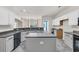 Open kitchen with an island, stainless steel appliances, and a view into the breakfast area at 140 Zinnia Dr., Myrtle Beach, SC 29579