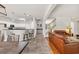 Open concept living space featuring a modern kitchen, living room, and access to the staircase at 140 Zinnia Dr., Myrtle Beach, SC 29579