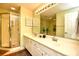 Bathroom features a double sink vanity, large mirror and tiled walk-in shower at 1401 Lighthouse Dr. # 4226, North Myrtle Beach, SC 29582