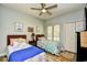 Bright bedroom with two twin beds, closet space and a ceiling fan at 1401 Lighthouse Dr. # 4226, North Myrtle Beach, SC 29582