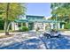 Exterior view of the fitness center with a golf cart parked nearby at 1401 Lighthouse Dr. # 4226, North Myrtle Beach, SC 29582