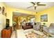 Spacious living room featuring hardwood floors and a ceiling fan at 1401 Lighthouse Dr. # 4226, North Myrtle Beach, SC 29582