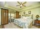 Main bedroom with ceiling fan and sliding glass door leading to a patio at 1401 Lighthouse Dr. # 4226, North Myrtle Beach, SC 29582