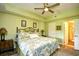 Main bedroom with a ceiling fan, dresser, and ensuite bathroom at 1401 Lighthouse Dr. # 4226, North Myrtle Beach, SC 29582
