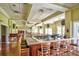 Bright restaurant interior with bar, tables, and chairs ready for guests at 1401 Lighthouse Dr. # 4226, North Myrtle Beach, SC 29582