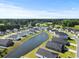 Desirable community features a pond, green spaces, sidewalks, and many homes at 153 Foxford Dr., Conway, SC 29526
