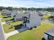 Community home features manicured lawns, water view, sidewalks, and backyard privacy at 153 Foxford Dr., Conway, SC 29526