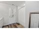 Bathroom with a shower, mirror, and wood look flooring at 153 Foxford Dr., Conway, SC 29526