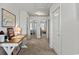Hallway with bedrooms and a desk featuring a framed sign 'Thanks and Giving' at 153 Foxford Dr., Conway, SC 29526