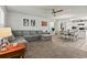 Inviting living room with open concept to kitchen, ceiling fan, recessed lights, and neutral colors at 153 Foxford Dr., Conway, SC 29526