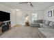 Comfortable living room featuring a TV, recessed lighting, ceiling fan, and neutral colors at 153 Foxford Dr., Conway, SC 29526