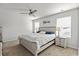 Bright main bedroom featuring a comfortable bed, nightstands and lots of natural light at 153 Foxford Dr., Conway, SC 29526