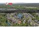 Desirable community aerial view featuring a tranquil lake and wooded landscape close to the beach at 156 Summerlight Dr., Murrells Inlet, SC 29576