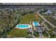 Community aerial view featuring pools, clubhouse, and sidewalks throughout the resort style community at 156 Summerlight Dr., Murrells Inlet, SC 29576
