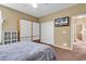 Bedroom featuring ample closet space and a mounted TV for convenient entertainment at 156 Summerlight Dr., Murrells Inlet, SC 29576