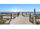 Easy beach access on this wood-planked walkway to the beach and the beautiful sea at 1617 Tradition Club Dr., Pawleys Island, SC 29585