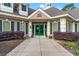 Front entrance to the clubhouse with well maintained landscaping at 1617 Tradition Club Dr., Pawleys Island, SC 29585
