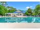 View of the community pool and the building that offers protection from the sun at 1617 Tradition Club Dr., Pawleys Island, SC 29585