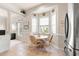 Bright breakfast nook with a bay window and comfortable seating, perfect for casual dining at 1617 Tradition Club Dr., Pawleys Island, SC 29585