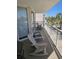 Relaxing balcony with rocking chairs, ideal for enjoying outdoor living and soaking in the views at 1625 S Ocean Blvd. # 106, North Myrtle Beach, SC 29582