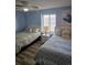 Comfortable bedroom with two beds, soft lighting, and modern decor for a relaxing stay at 1625 S Ocean Blvd. # 106, North Myrtle Beach, SC 29582